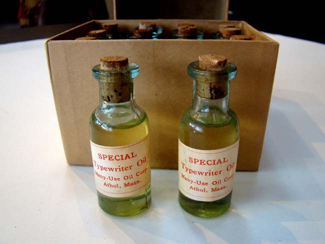 A RARE case of 12 unopened bottles of Typewriter Oil made by the 'Many Use Oil Corp.' of Athol, Mass., circa 1900